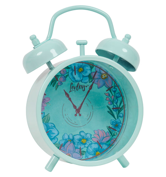 Light blue alarm clock with floral design on a white background